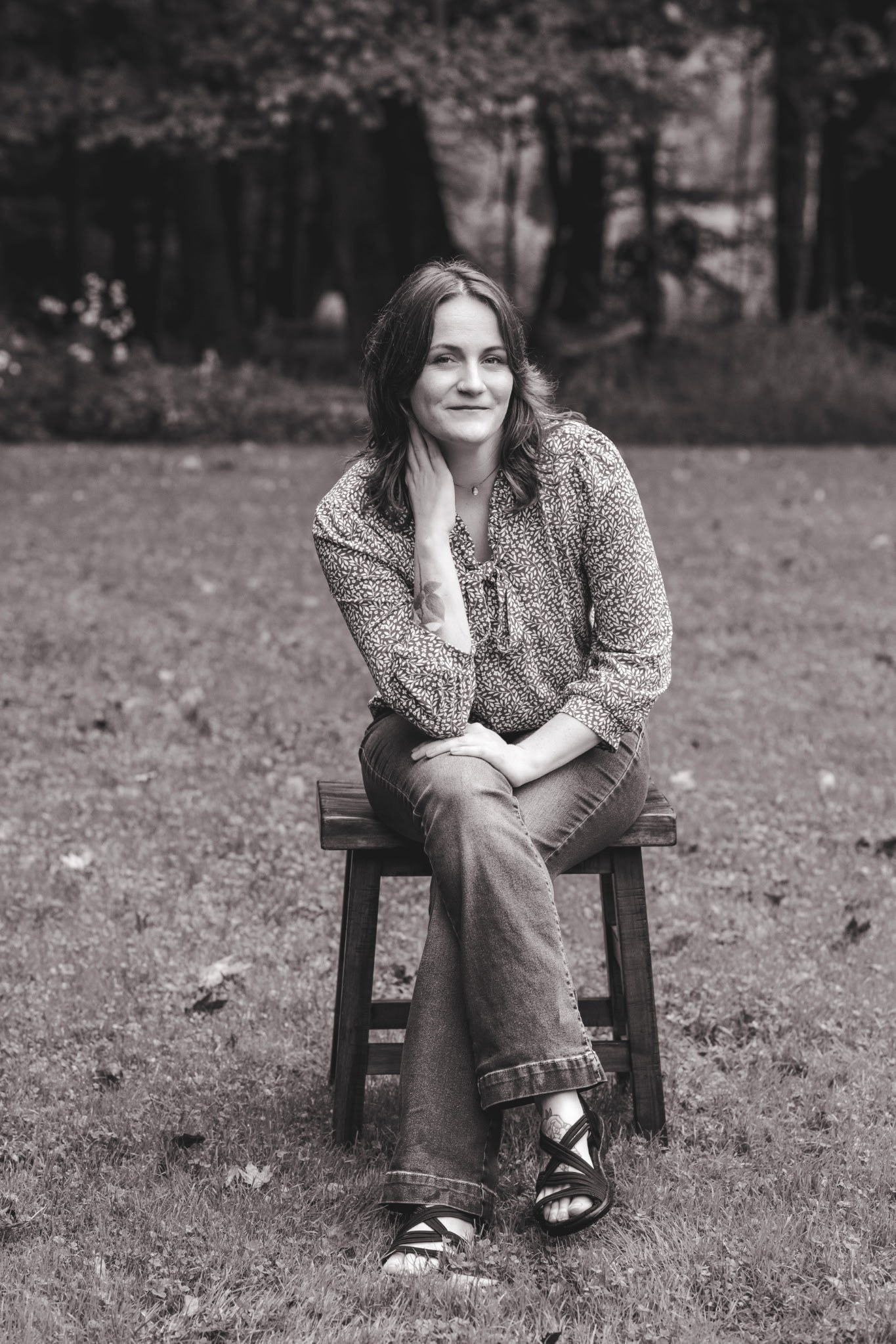 Amber Thaman seated outdoors